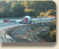 construction truck and workers working on the Laural Curve project