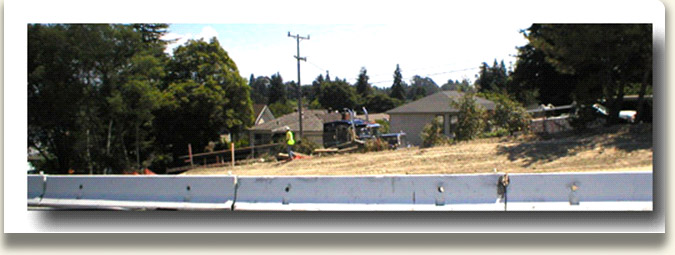 Caltrans worker reviewing Hwy1/17 construction work